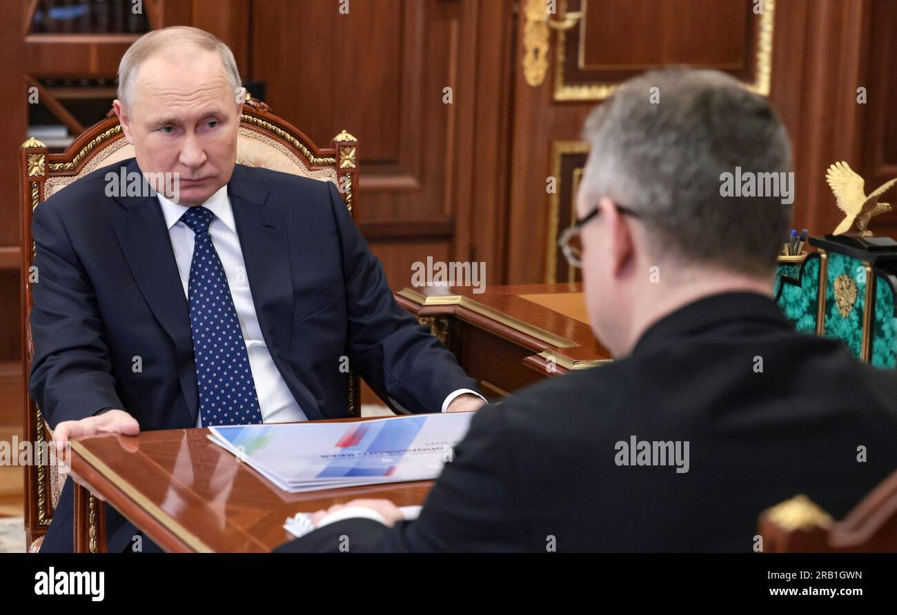 Moscow, Russia. 06th July, 2023. Russian President Vladimir Putin during a face-to-face meeting with Stavropol Territory Governor Vladimir Vladimirov, right, at the Kremlin, July 6, 2023 in Moscow, Russia. Credit: Alexander Kazakov/Kremlin Pool/Alamy Live News Stock Photo