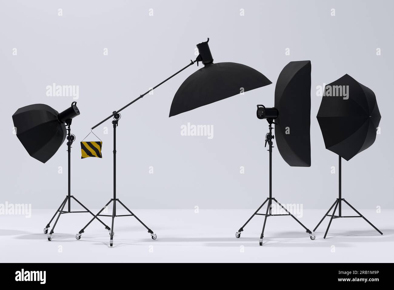 Photography studio flash on a lighting stand isolated on white ...