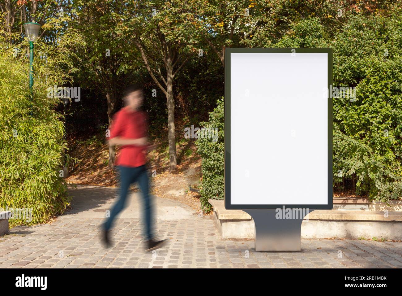Blank street billboard poster stand in the park Stock Photo - Alamy