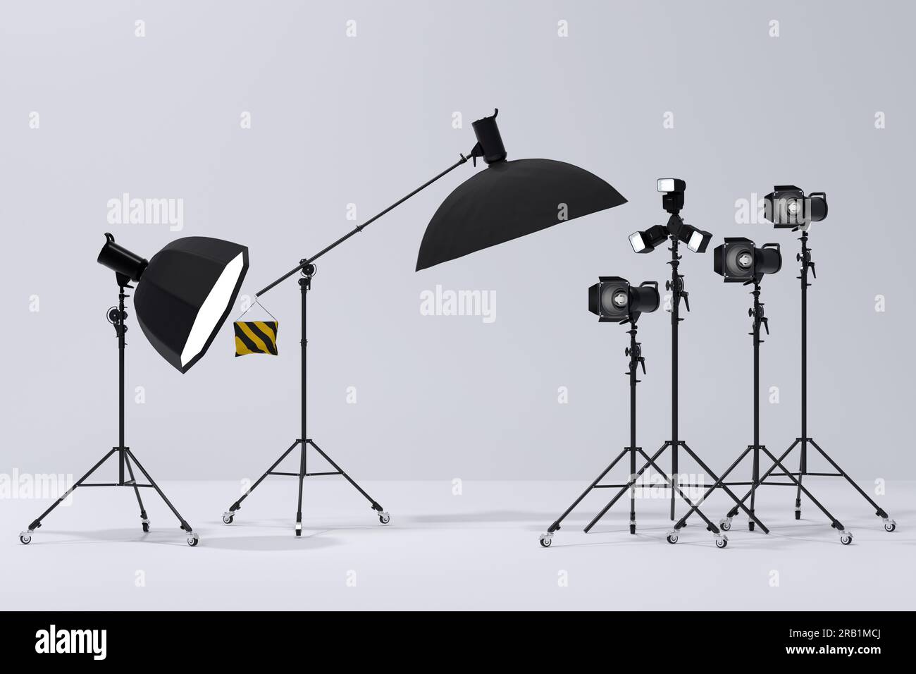 Photography studio flash on a lighting stand isolated on white ...