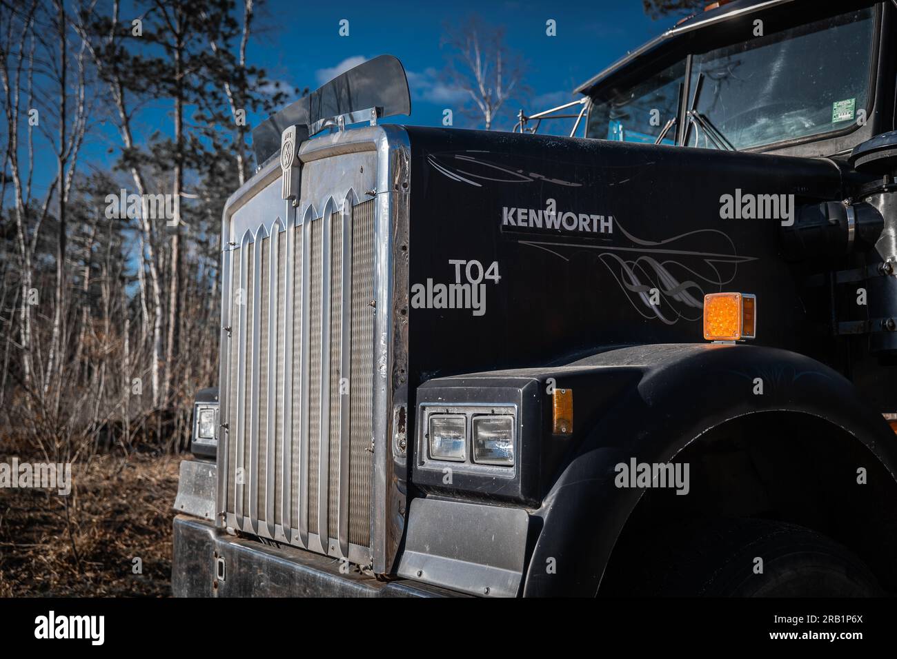 NISSWA, MN – 25 APR 2023: Front of older working Kenworth truck in close up from drivers side. Stock Photo