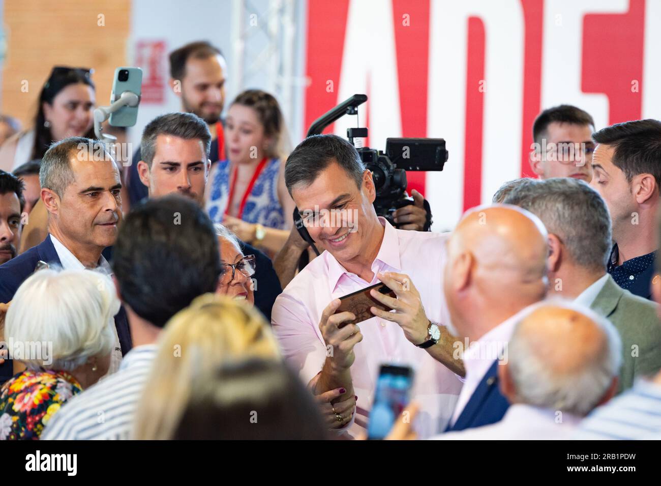 Madrid, Spain. 06th July, 2023. Spanish prime minister Pedro Sanchez takes a selfie with a voter during the opening act of PSOE party celebration in Madrid in order to start the campaign for the upcoming general elections of 23 of July. Credit: SOPA Images Limited/Alamy Live News Stock Photo