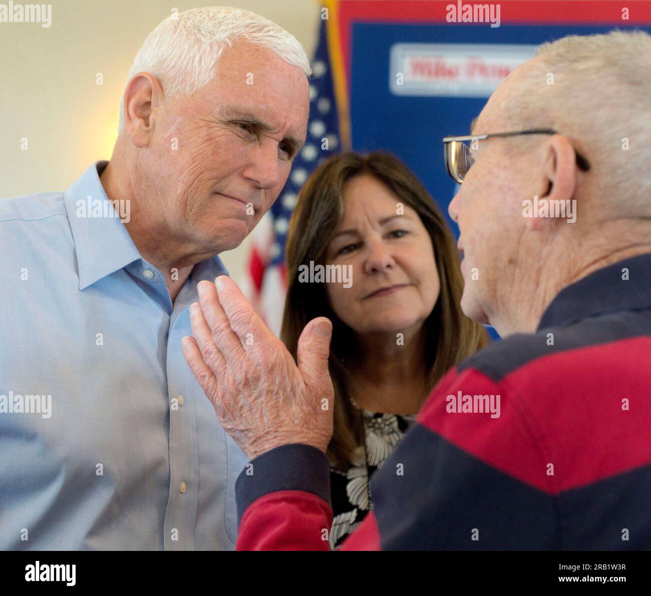 Holstein, Iowa, USA. 06th July, 2023. Former Vice President and current candidate for the 2024 Republican presidential nomination, MIKE PENCE, and KAREN PENCE greet a voter at the Cobblestone Inn during a campaign stop in Holstein, Iowa.(Credit Image: © Brian Cahn/ZUMA Press Wire) EDITORIAL USAGE ONLY! Not for Commercial USAGE! Stock Photo