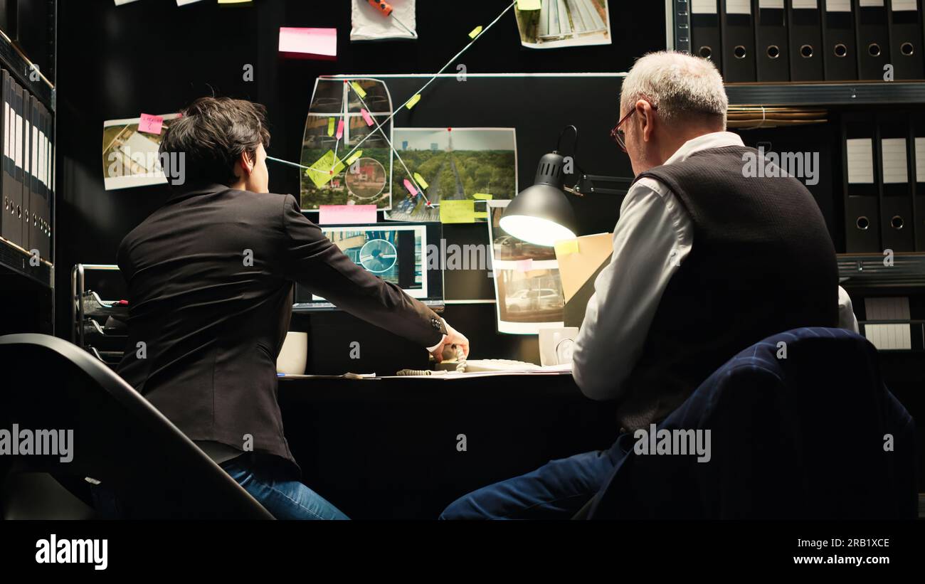 Law agents answering phone call to find forensic evidence authenticity