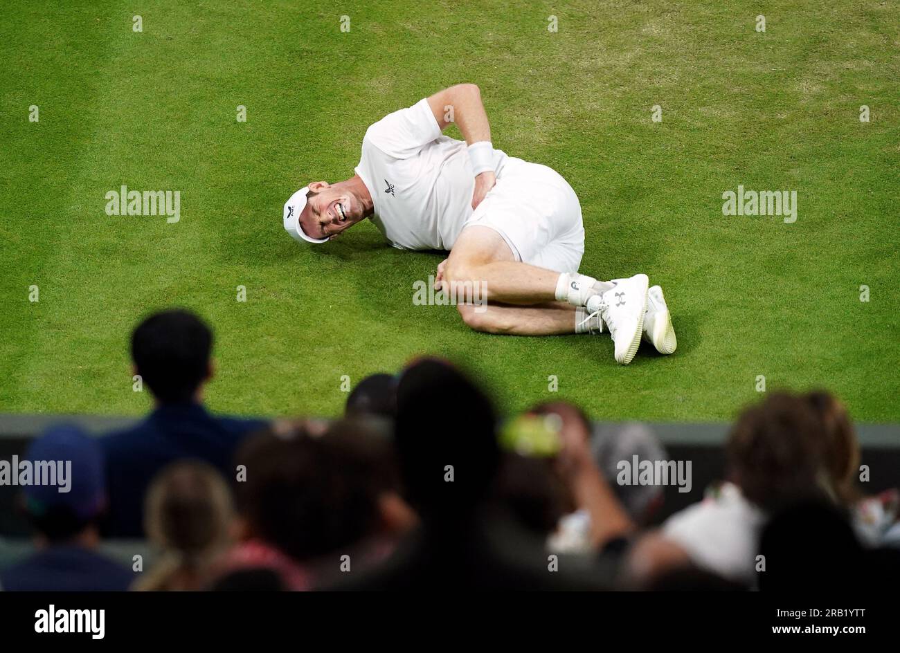 Andy Murray slips on court during his match against Stefanos Tsitsipas