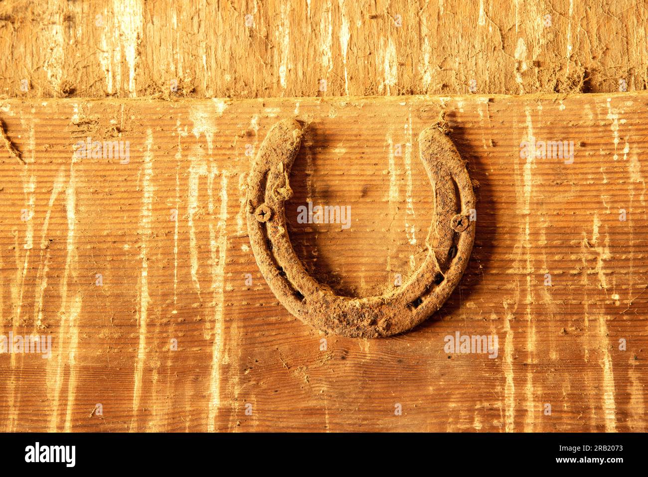 A horseshoe hangs in a barn in central Oregon Stock Photo - Alamy