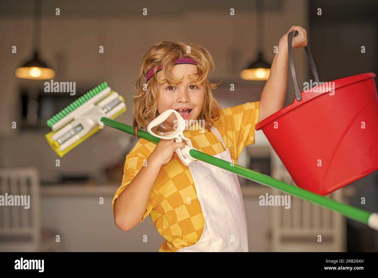 Children helping with housekeeping, cleaning the house. Housekeeping at
