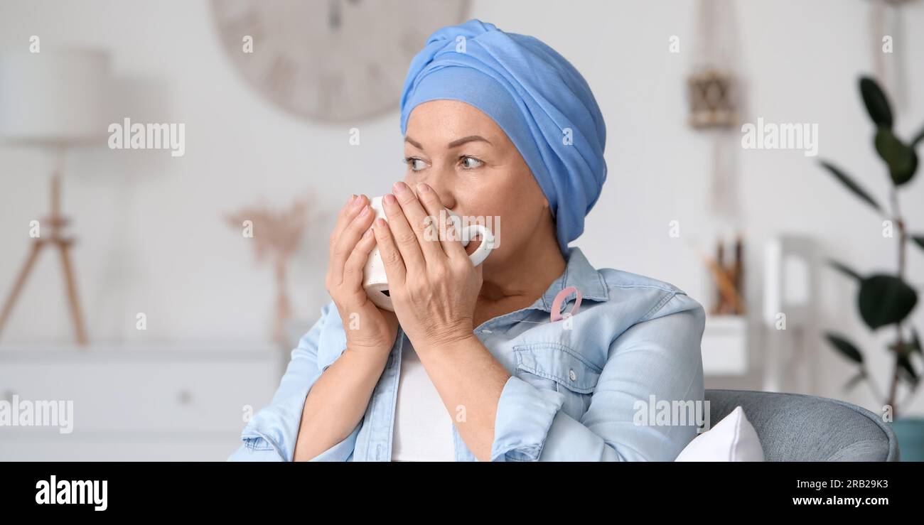 Mature woman after chemotherapy drinking tea at home Stock Photo Alamy