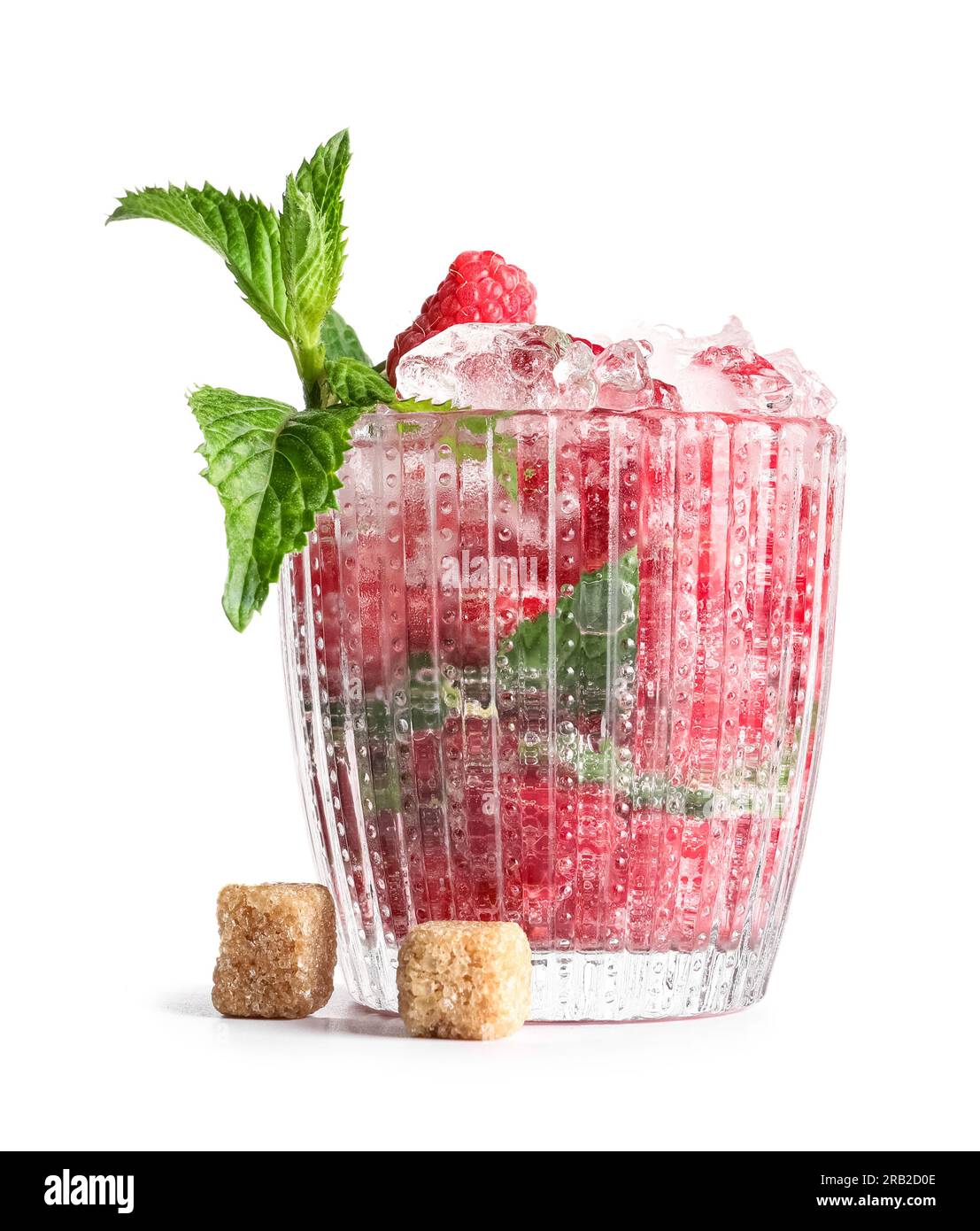 Glass of fresh raspberry lemonade with mint on white background Stock Photo