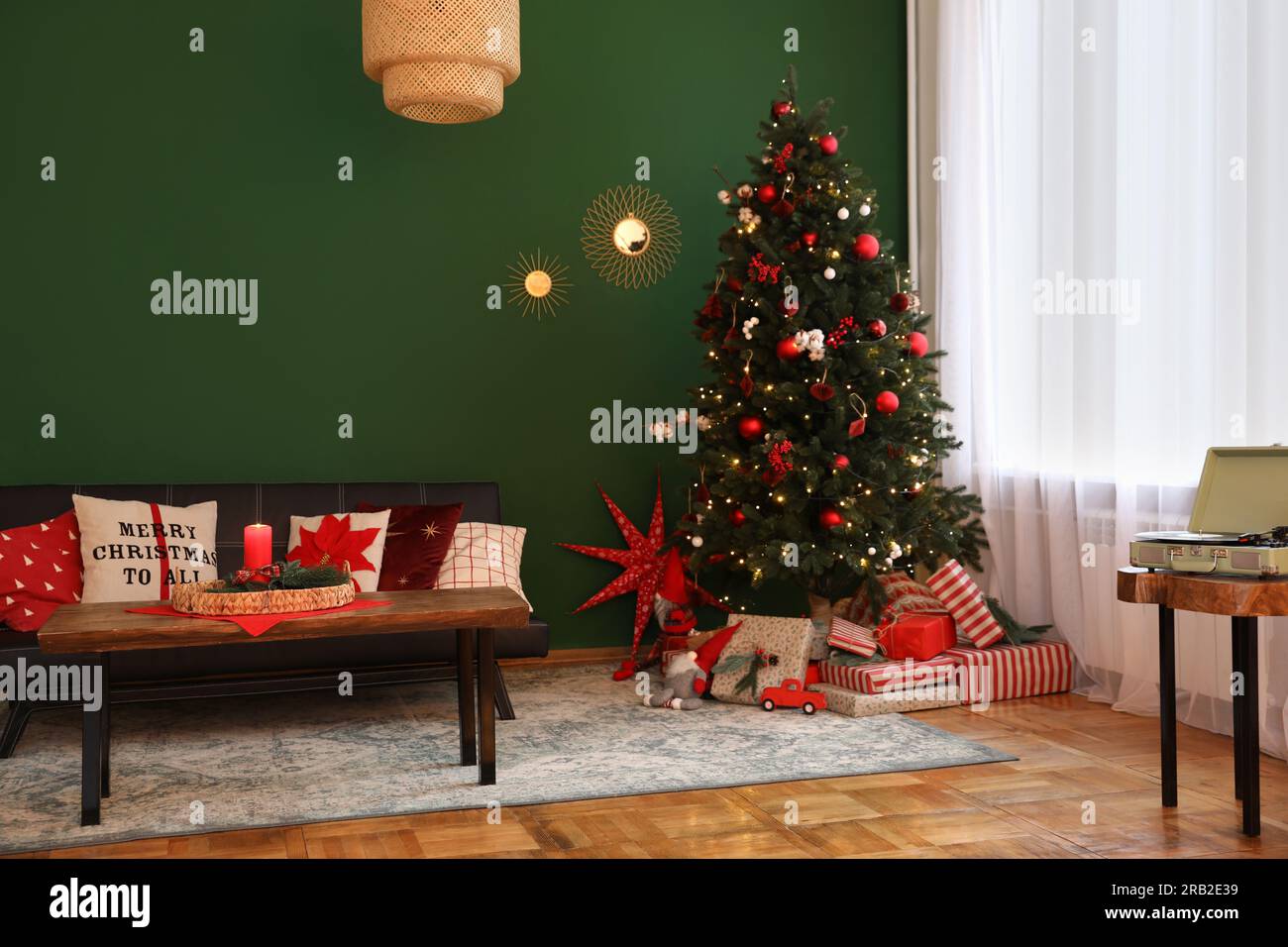 Cozy living room with Christmas tree and festive decor. Interior design ...