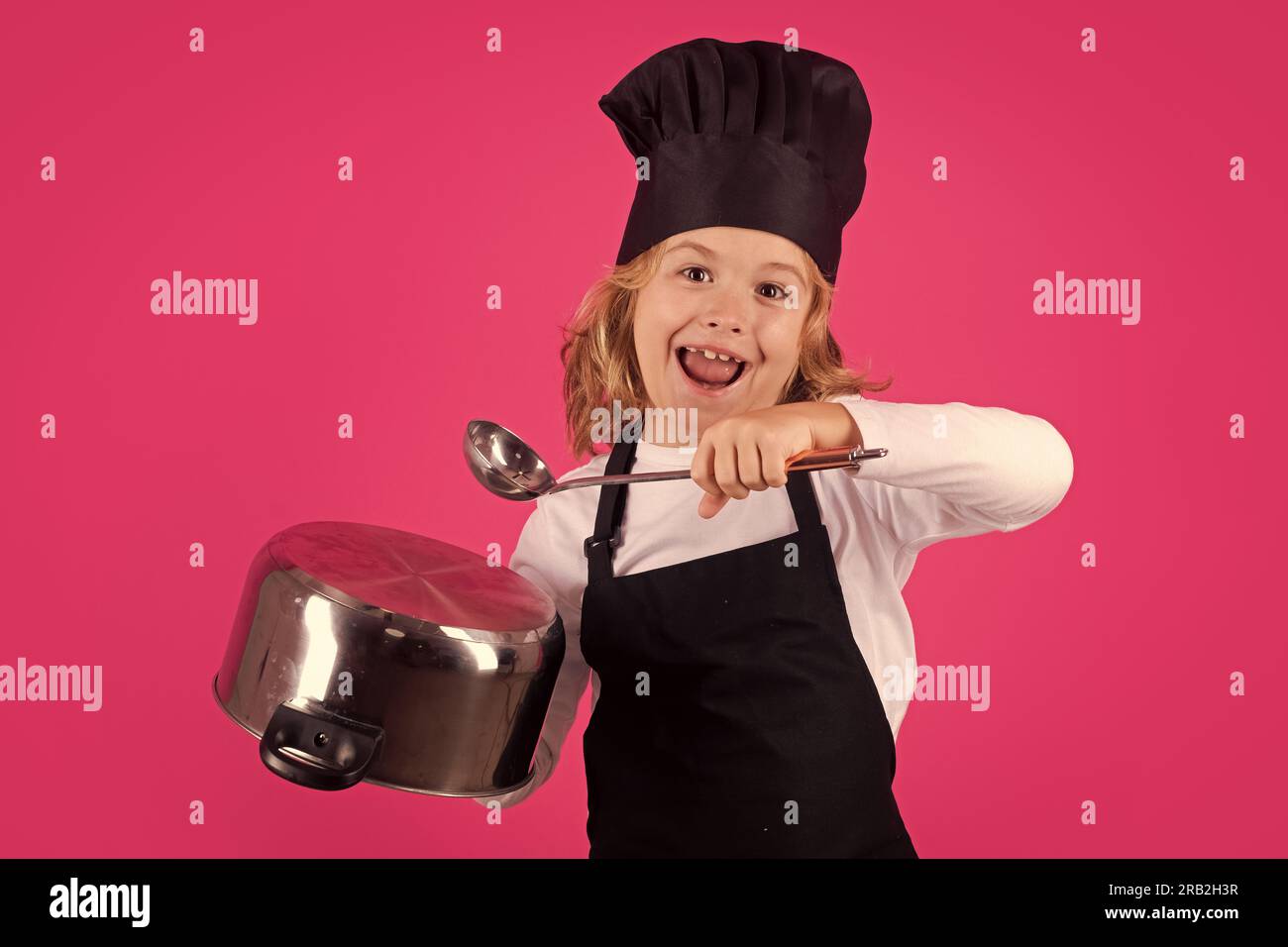Fynny kid chef cook with cooking pot and ladle. Kid chef cook, studio