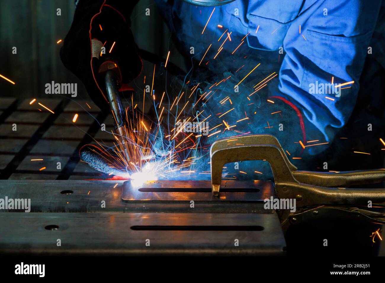 Skilled welder carries out various welding works using semi automatic