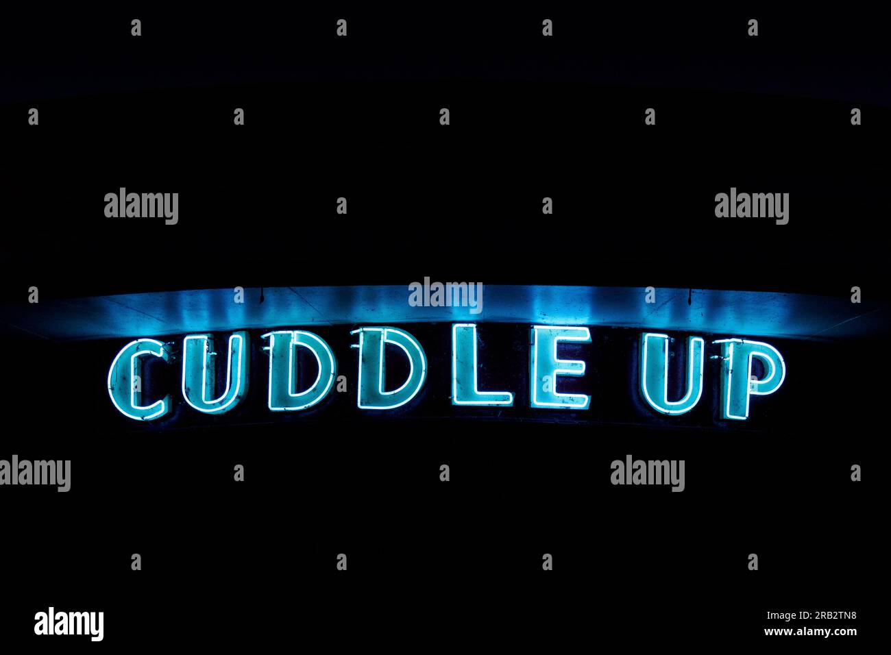 Cuddle Up Pavilion with neon sign lit at night, Glen Echo Park, MD, USA Stock Photo