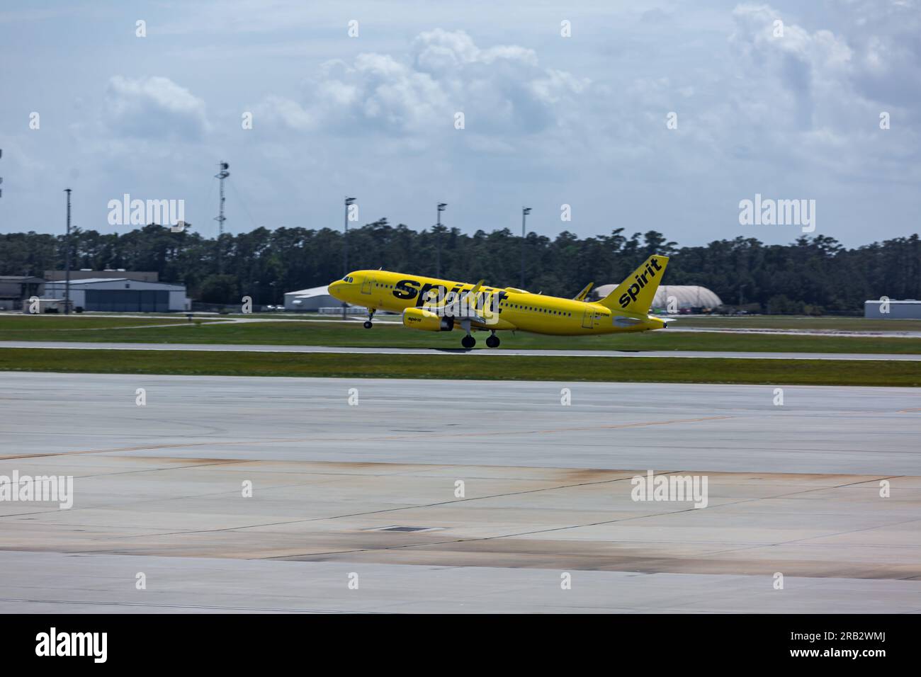 A Spirit Airlines Airbus A320 passenger jet airliner takes off from Myrtle Beach International Airport in Myrtle Beach, South Carolina, USA. Stock Photo