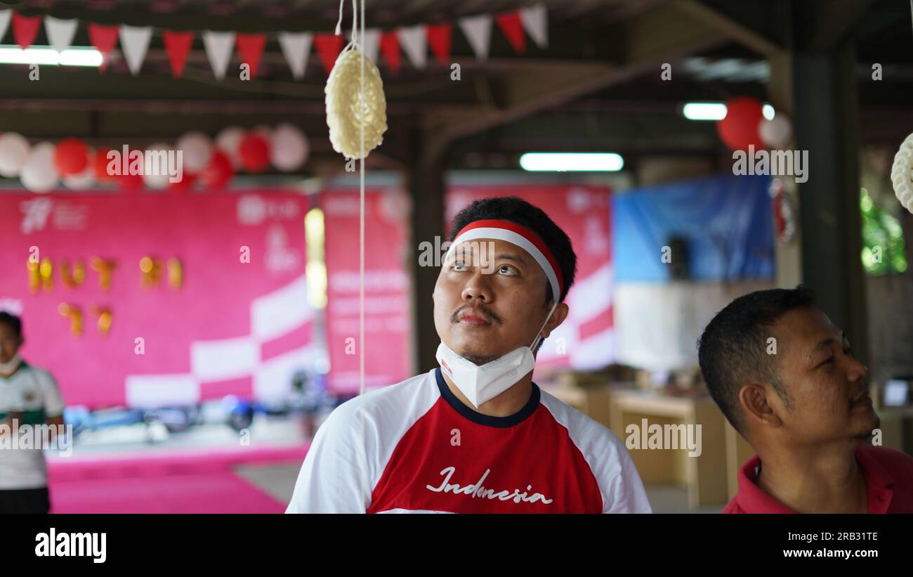cracker eating competition, Indonesian Independence Day Stock Photo Alamy