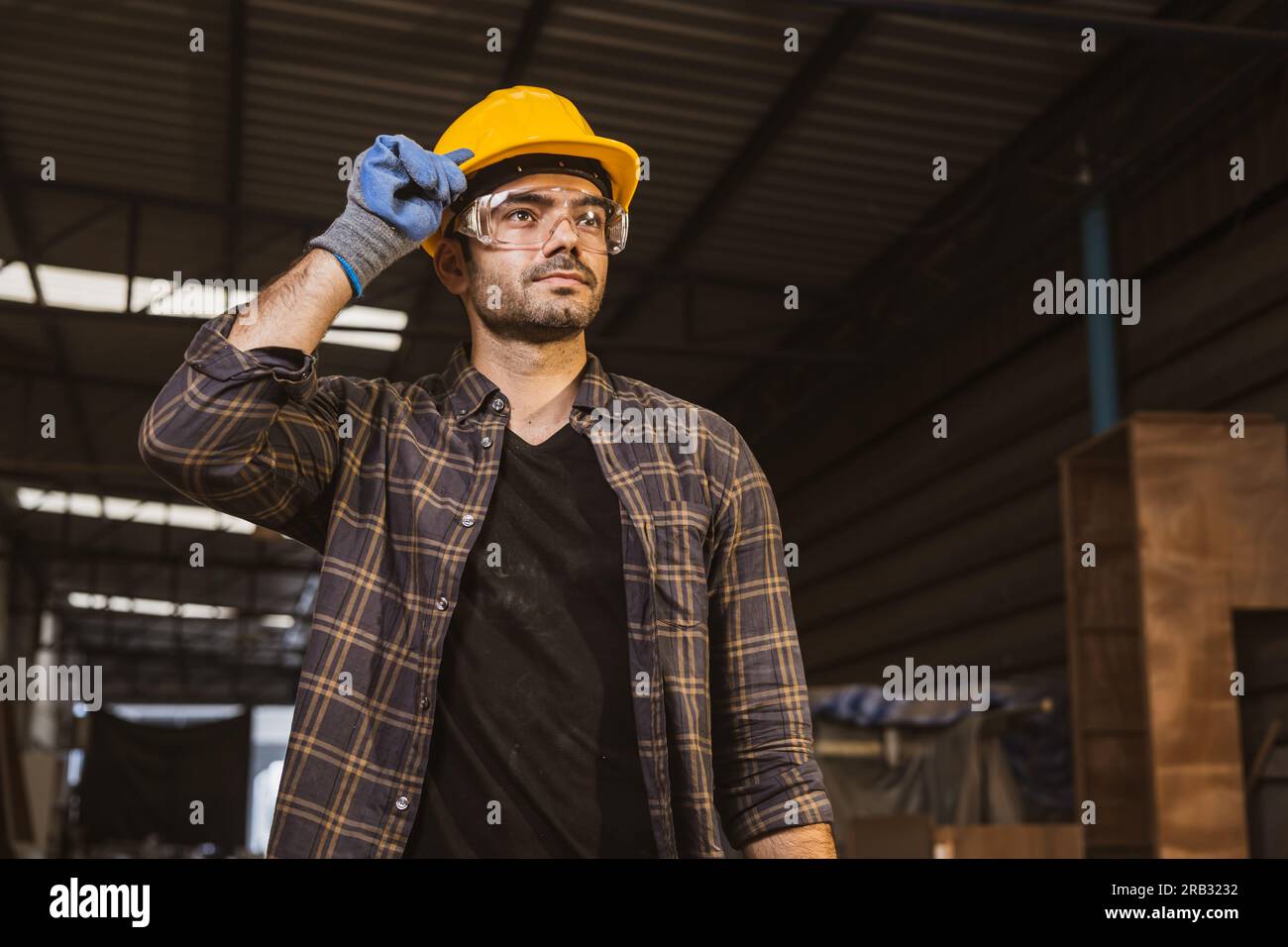 portrait hispanic indian male wood worker standing looking happy smile, construction builder man. Stock Photo