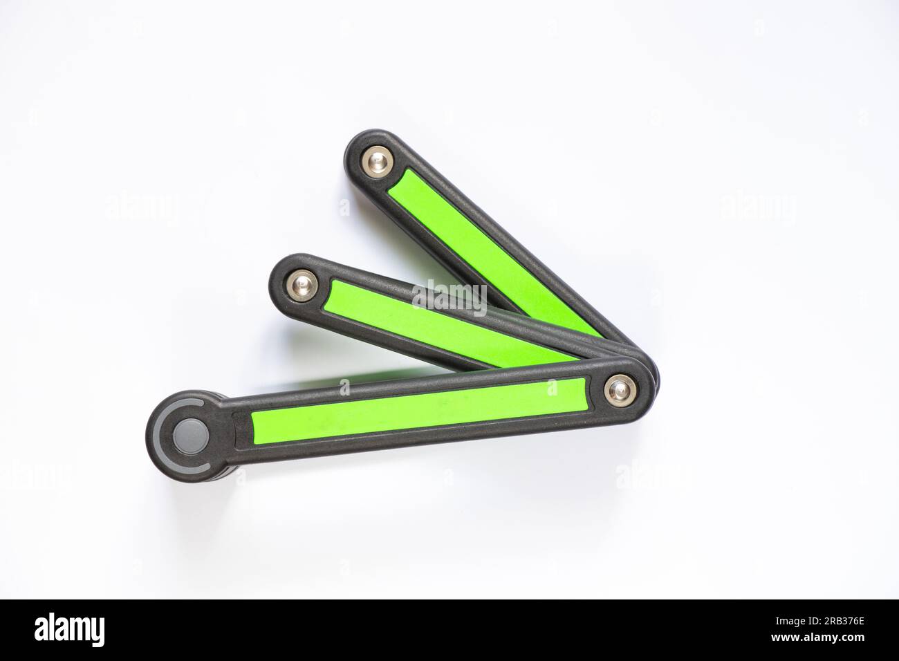 segmented anti-theft bicycle lock on white background close-up Stock Photo