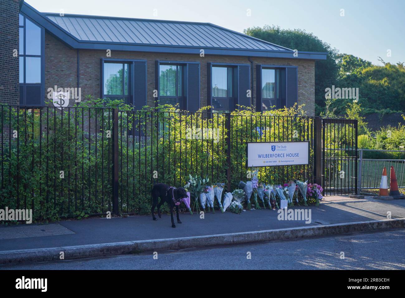 London UK. 7 July 2023 . Floral tributes at the gates of The