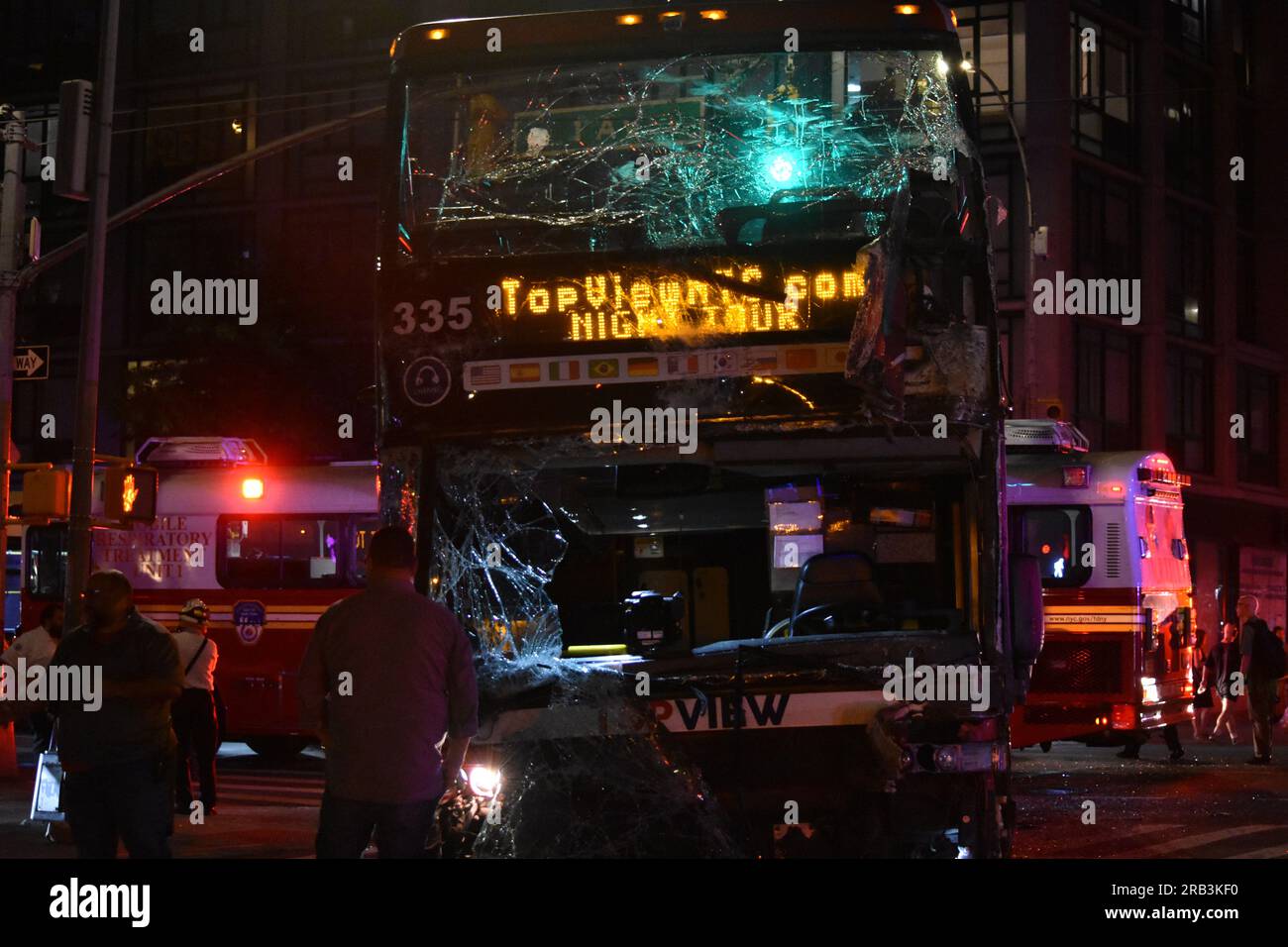 Investigators Surround The Double Decker Tour Bus Involved In The Accident Injuring More Than 9256