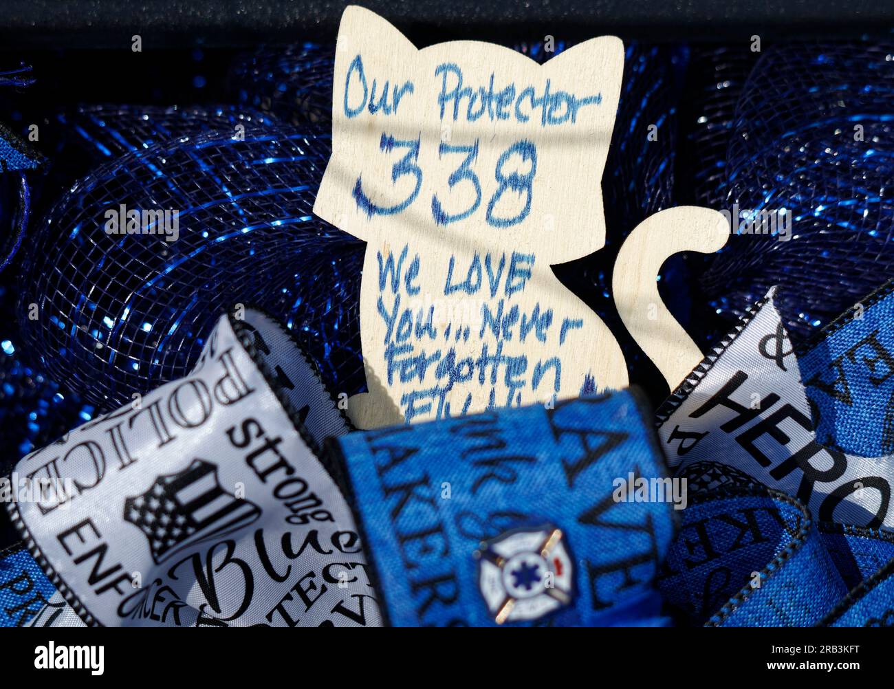 A handwritten tribute to Tell City Police Department Sgt. Heather J. Glenn in the shape of a cat and referencing her badge number adorns the bumper of her patrol vehicle on Thursday, July 6, 2023 near city hall in Tell City, Troy Township, Perry County, IN, USA. Glenn, 47, was shot and killed July 3 while trying to arrest a domestic violence suspect at a local hospital, becoming the first line-of-duty death in the Tell City Police Department's nearly 165-year history and second Indiana police officer to be killed in the line of duty in less than a week. (Apex MediaWire Photo by Billy Suratt) Stock Photo