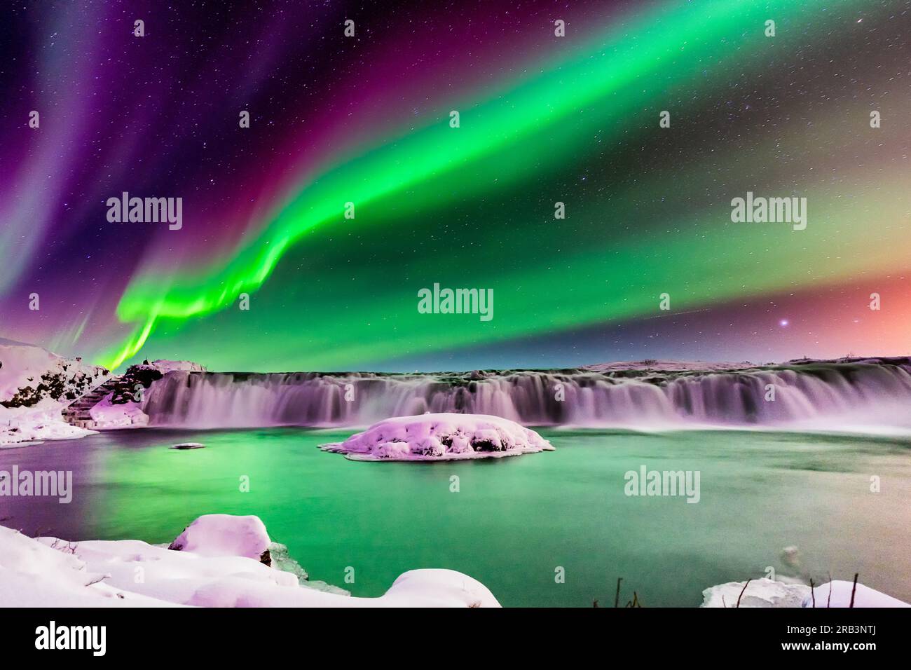 Strong northern lights in Iceland, Faxafoss Stock Photo Alamy