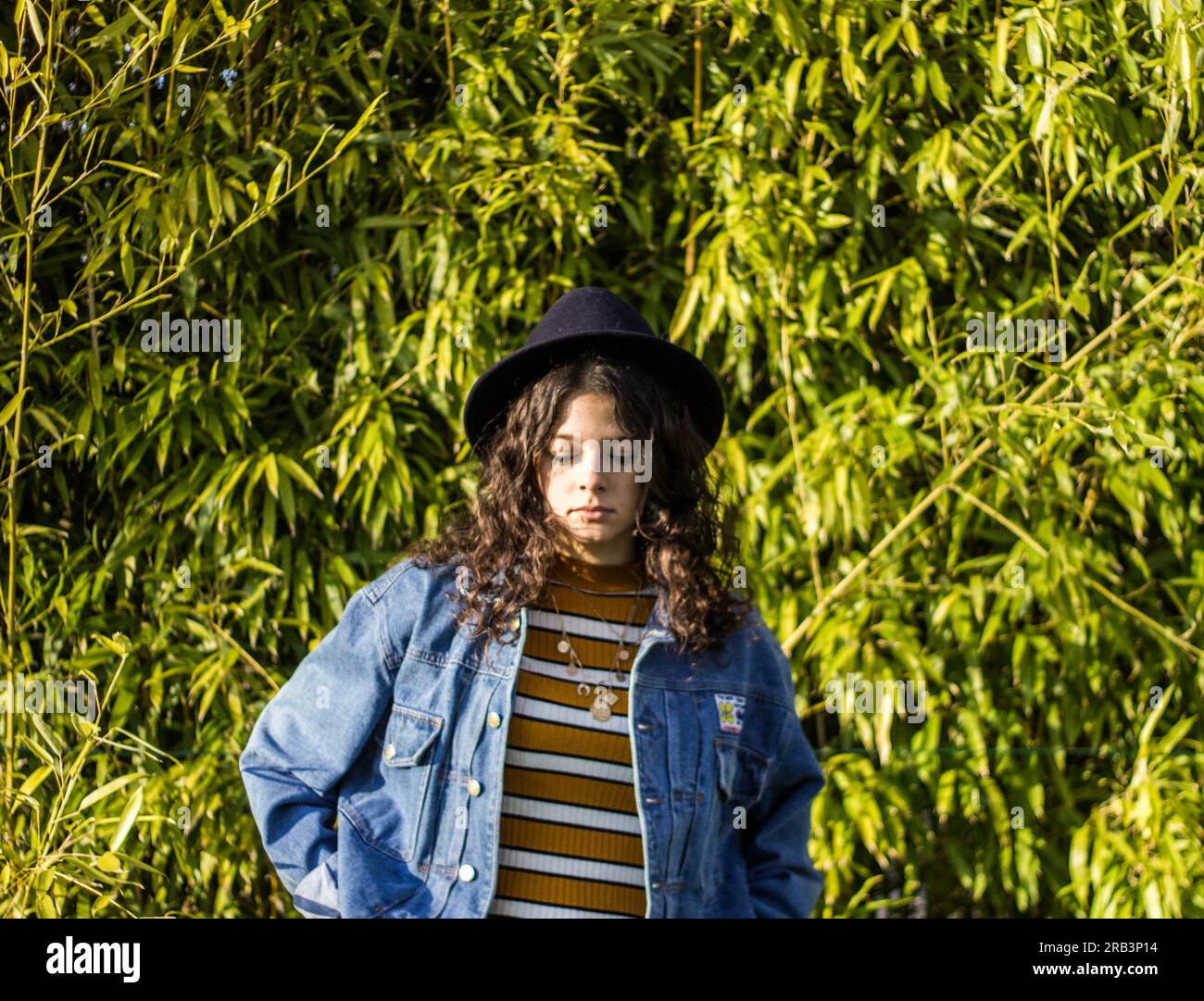 Female curly brunette hair hi-res stock photography and images - Alamy