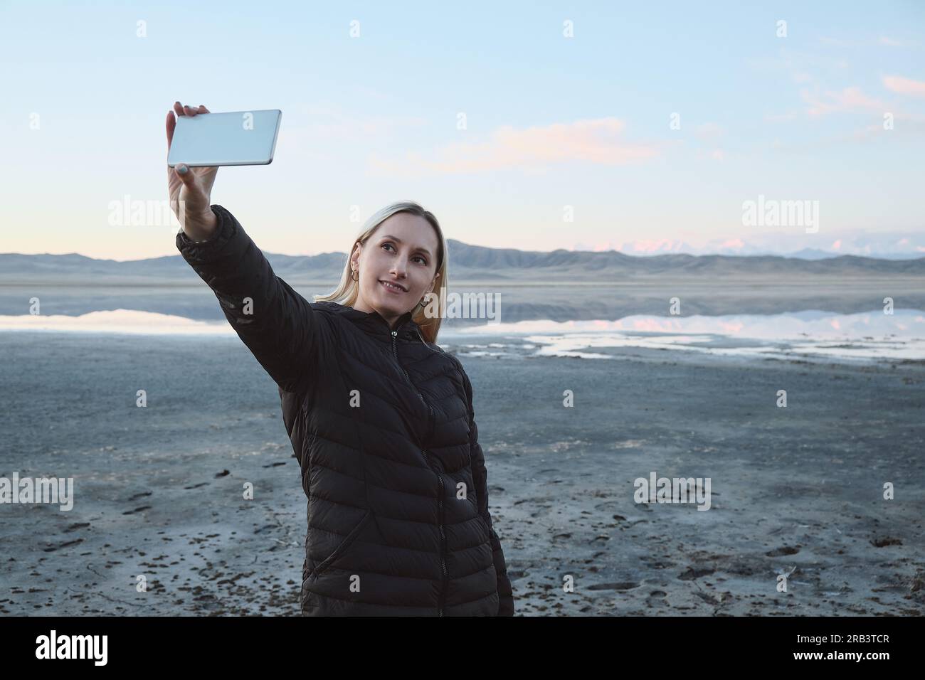 Woman traveler takes selfie in hi-res stock photography and images - Alamy