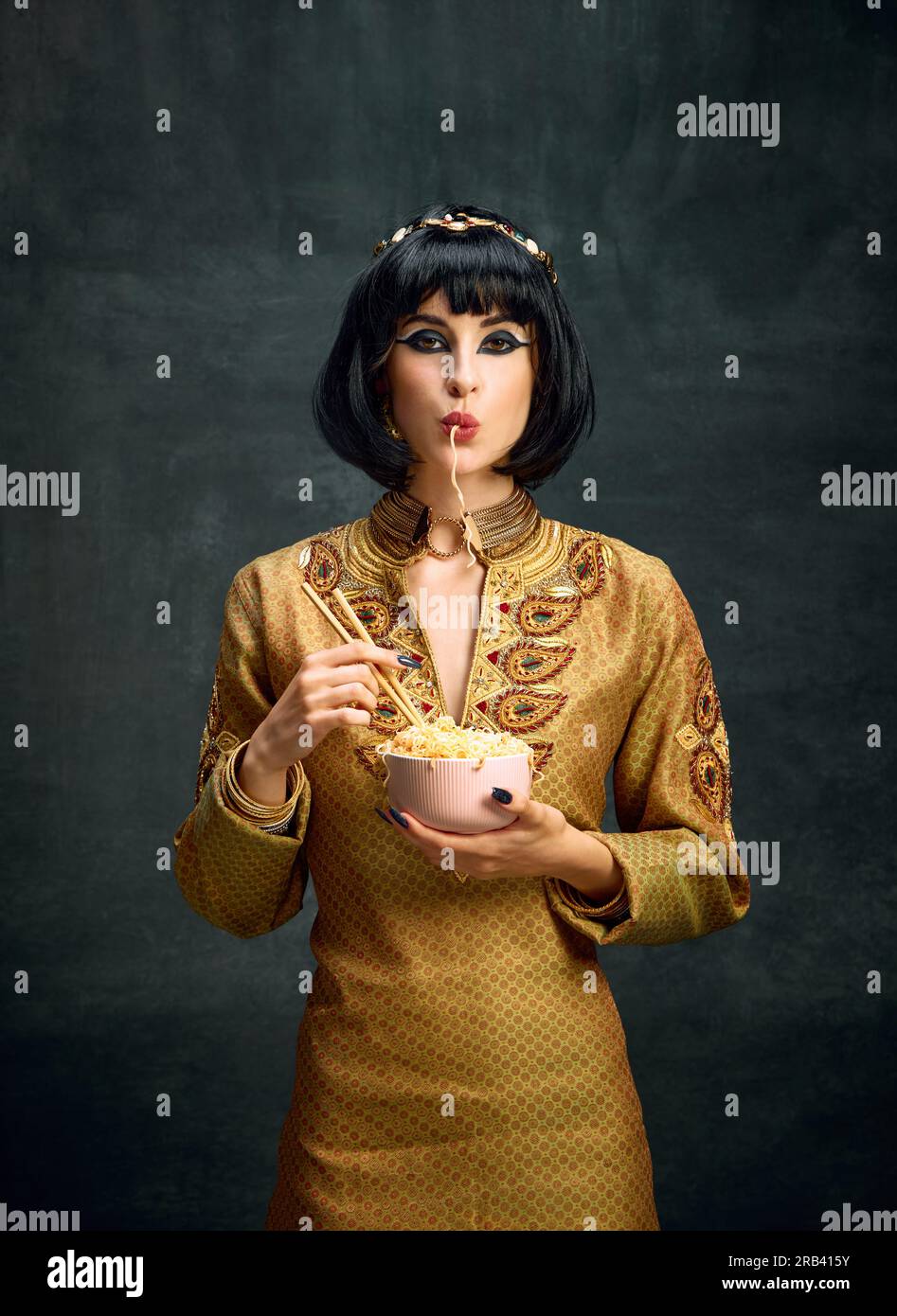 Tasty. Beautiful young woman in image of egyptian queen, Cleopatra ...