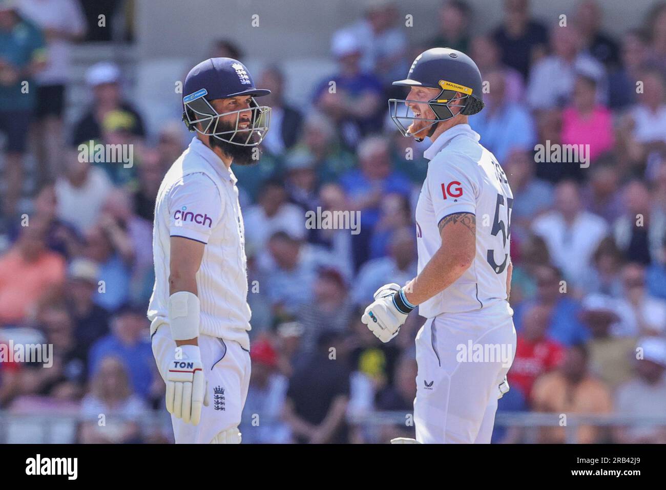 Ben Stokes of England congratulates Moeen Ali of England on hitting a four during the LV= Insurance Ashes Third Test Series Day 2 England v Australia at Headingley Stadium, Leeds, United Kingdom, 7th July 2023  (Photo by Mark Cosgrove/News Images) Stock Photo