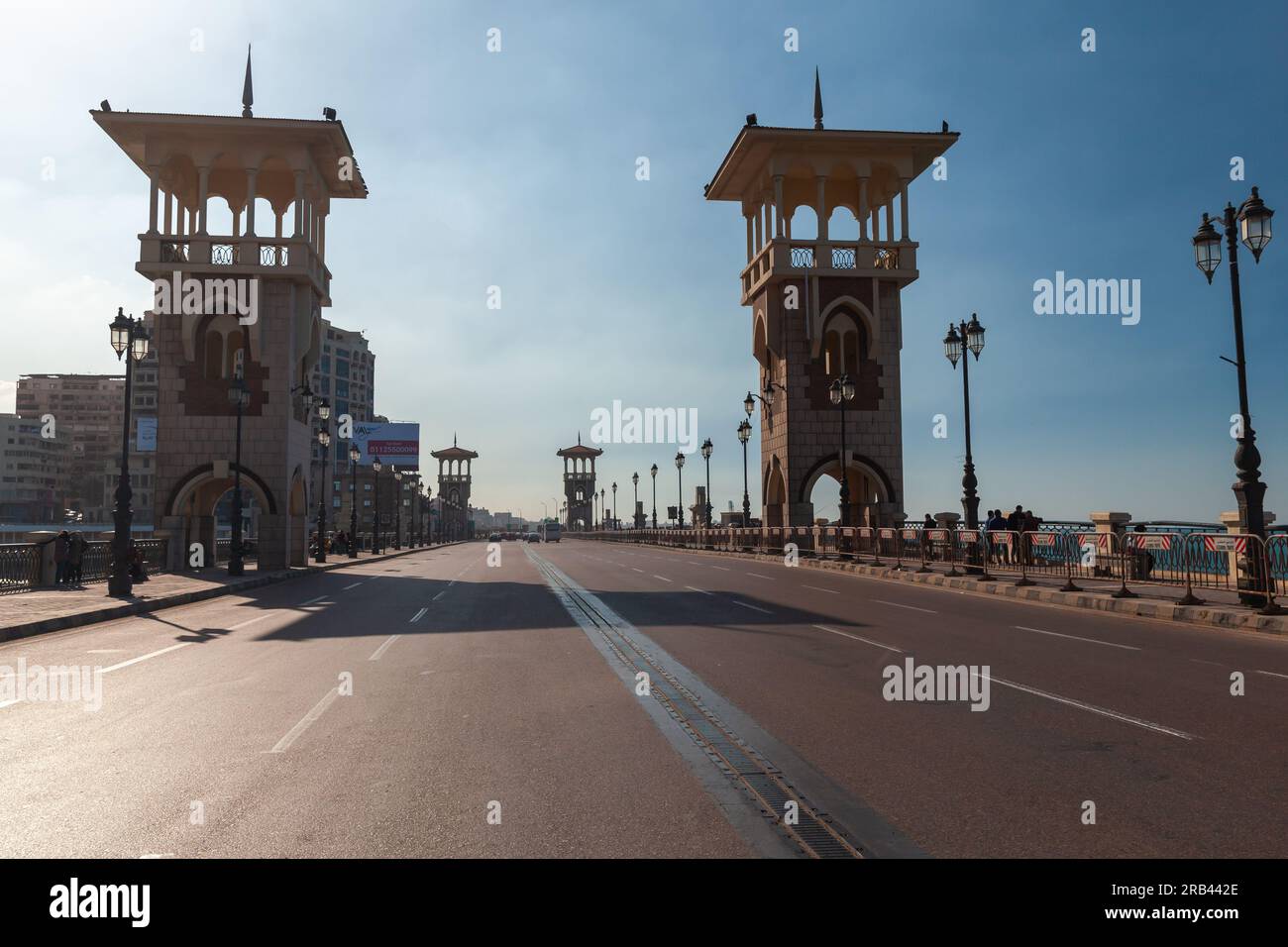 Alexandria, Egypt - December 14, 2018: Stanley Bridge perspective view, popular landmark of Alexandria, ordinary people walk the street Stock Photo
