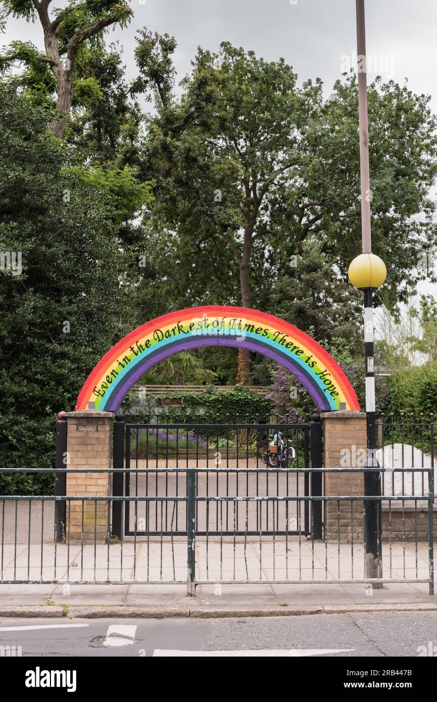 Even In The Darkest Of Times There Is Hope rainbow sign outside the Archdeacon of Cambridge's Church of England Primary School, The Green, Twickenham Stock Photo