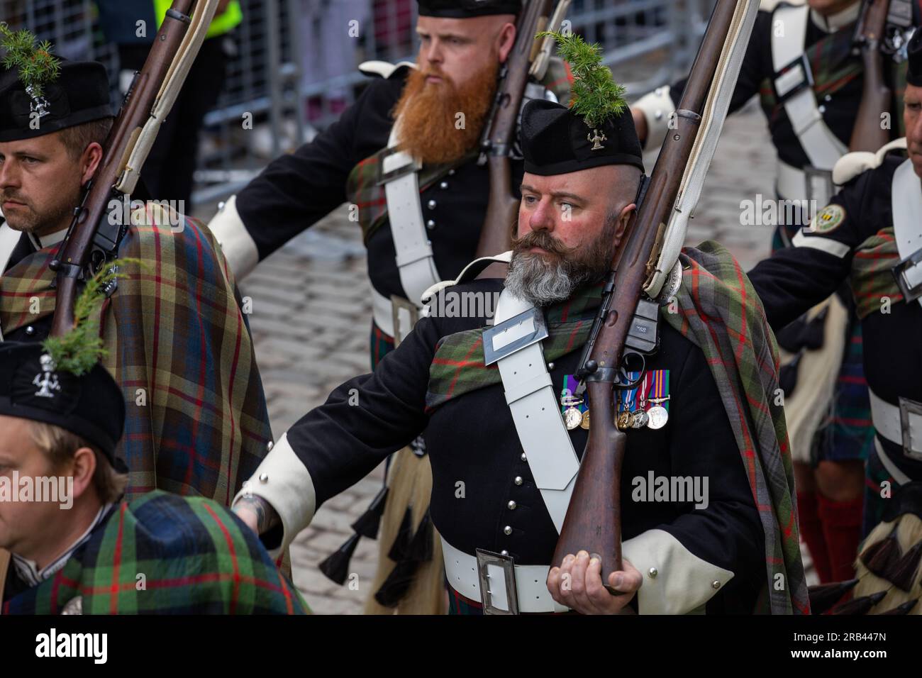 Atholl Highlanders the only private army remaining in Europe marching during the King being presented with the Honours of Scotland, in Edinburgh. Stock Photo