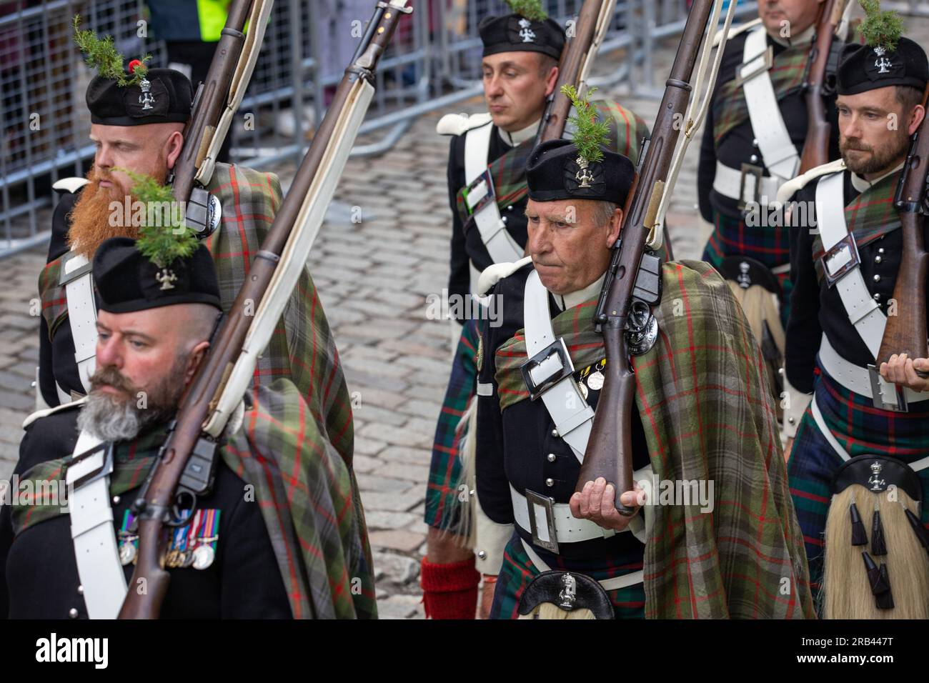Atholl Highlanders the only private army remaining in Europe marching during the King being presented with the Honours of Scotland, in Edinburgh. Stock Photo