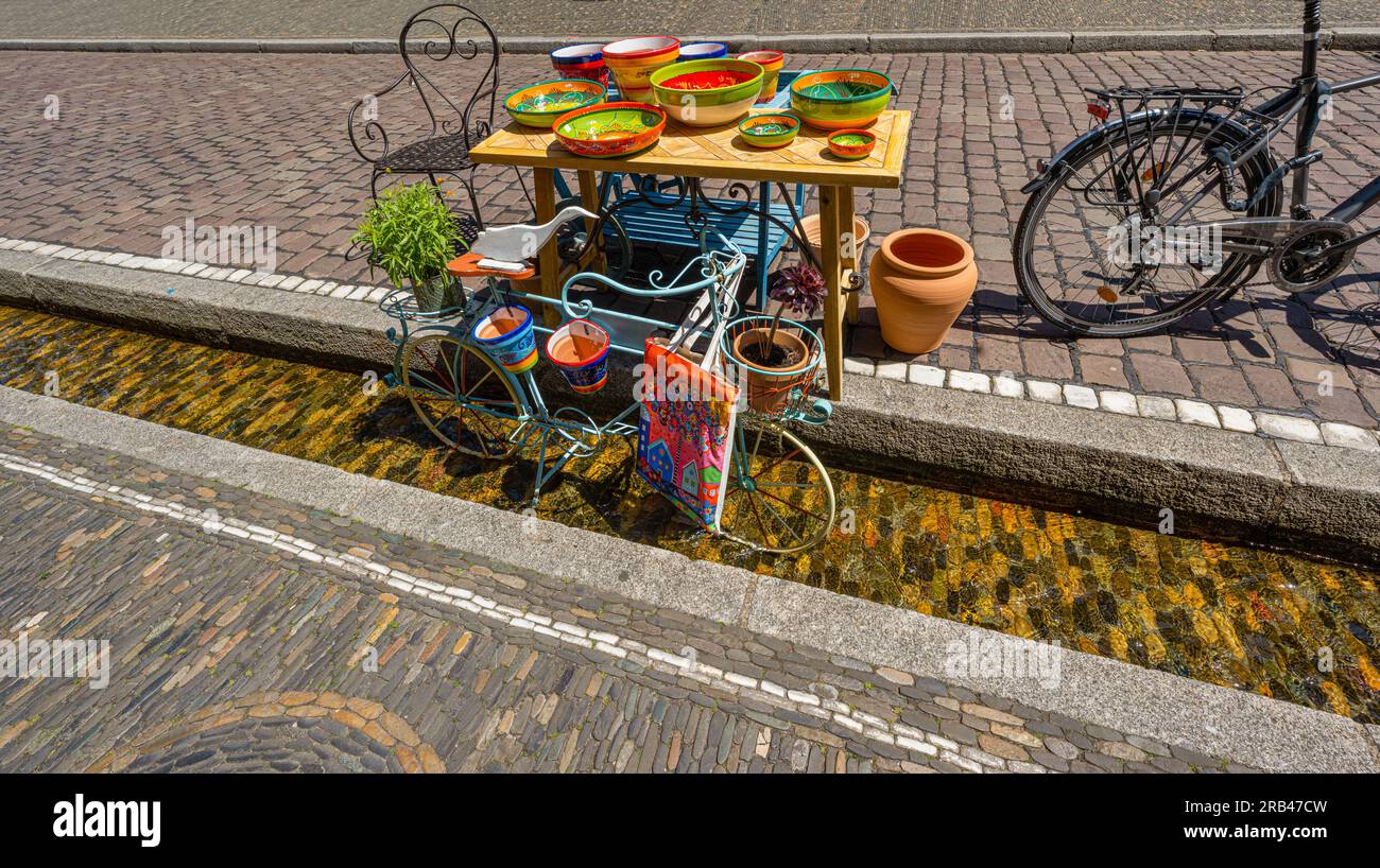 Freiburger runlet (called in German, Freiburger Bächle) - artificial watercourses in most of the streets and alleys of the old town. Baden Wuerttember Stock Photo