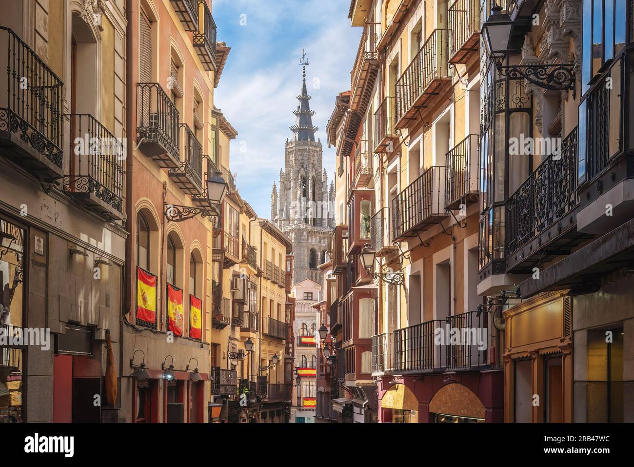 Street and Toledo Cathedral Tower - Toledo, Spain Stock Photo