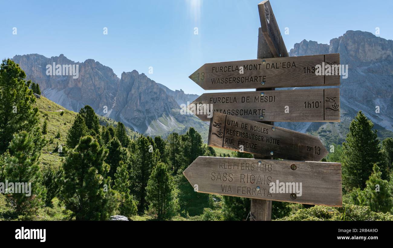 Signs leading the way for hiking in the Geisler mountain range in the ...