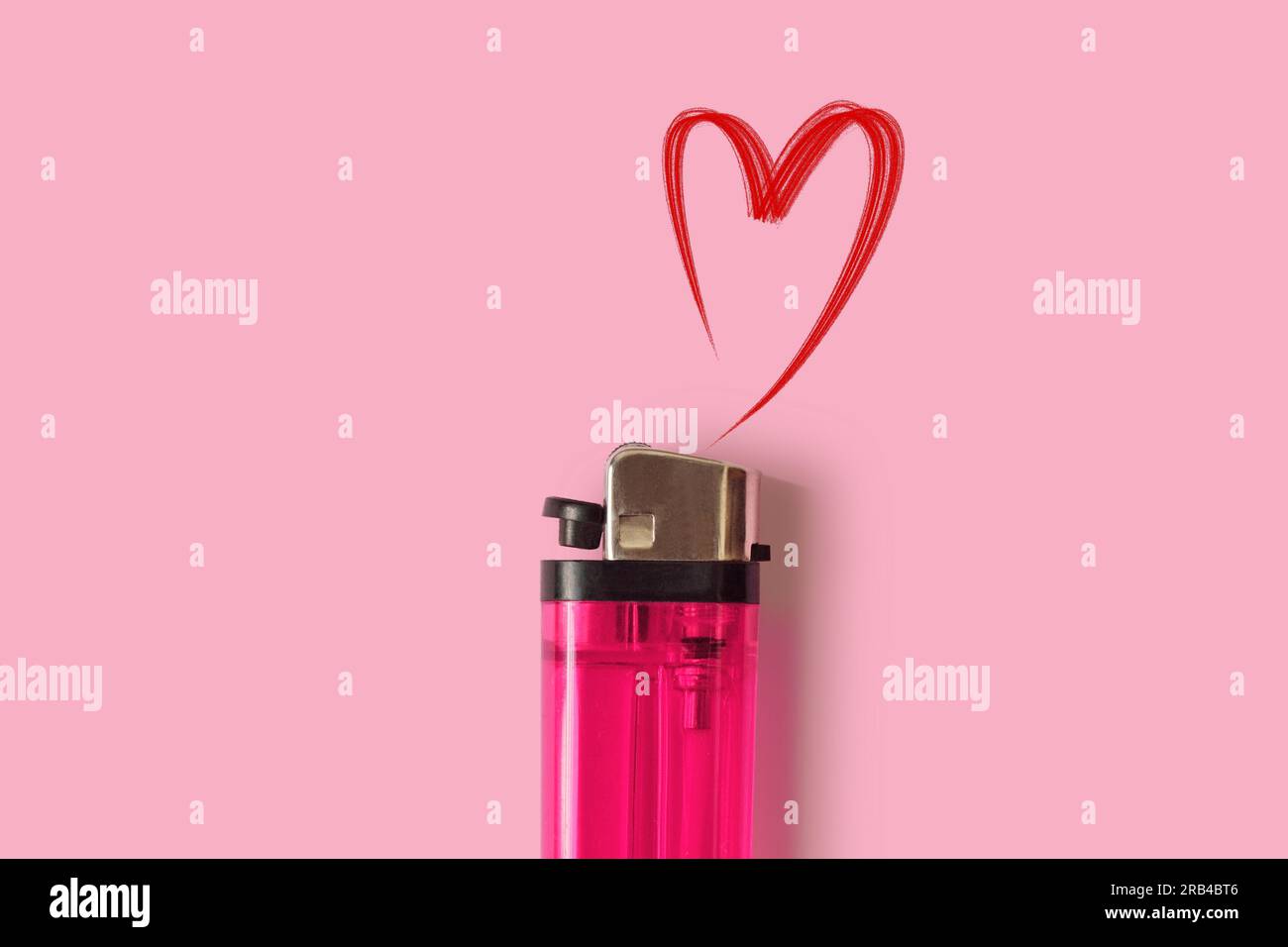 Pink lighter with heart on pink background - Concept of woman and love Stock Photo