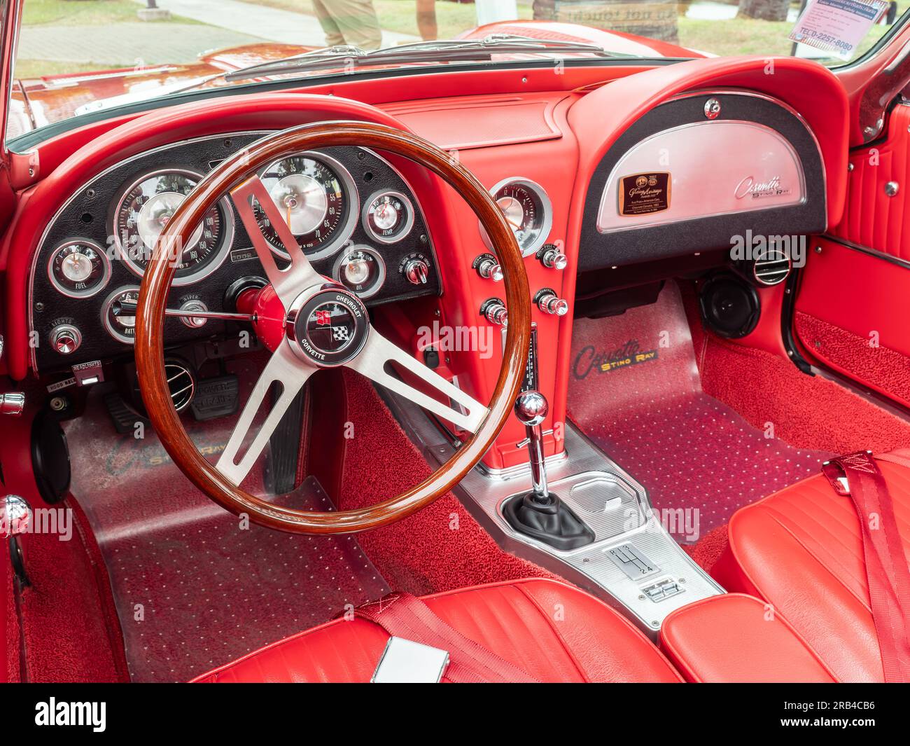 Dashboard of red, 1963 model Chevrolet Corvette Stingray Convertible. Stock Photo