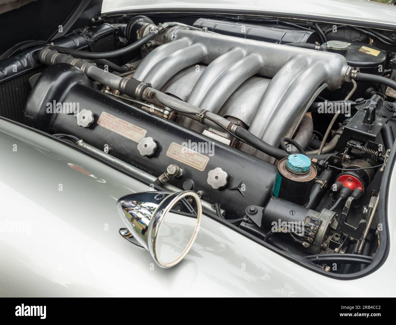 Engine of a 1954 Mercedes Benz 300 SL Gullwing Coupe, manufactured from 1954 to 1957. The 300 SL is one of the most sought after cars from its period. Stock Photo