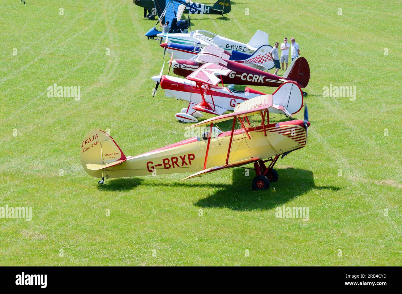 Planes on display at a wings and wheels flyin event in the countryside