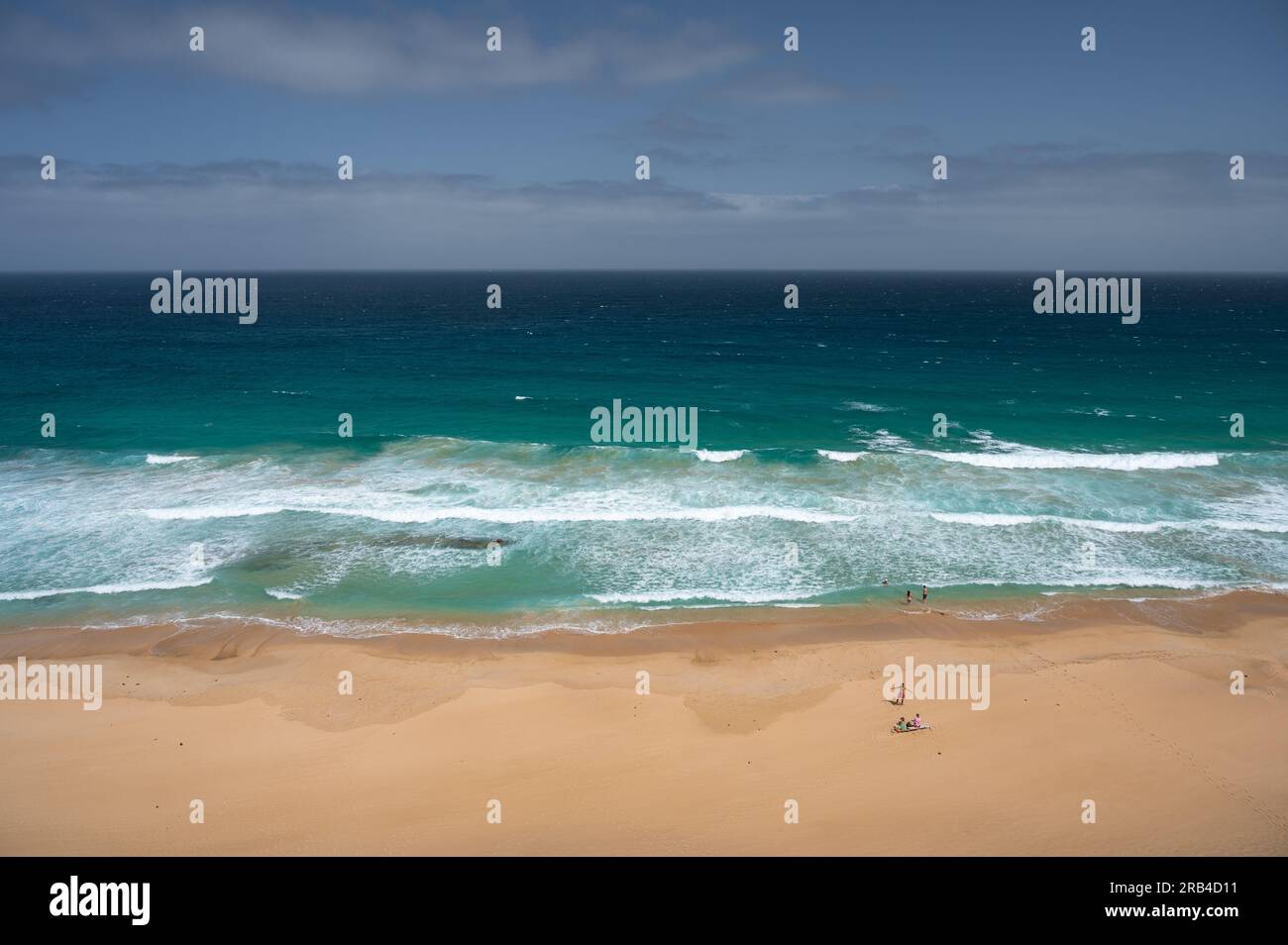 tourists-enjoy-a-hot-summer-day-in-las-escaleras-beach-with-clear