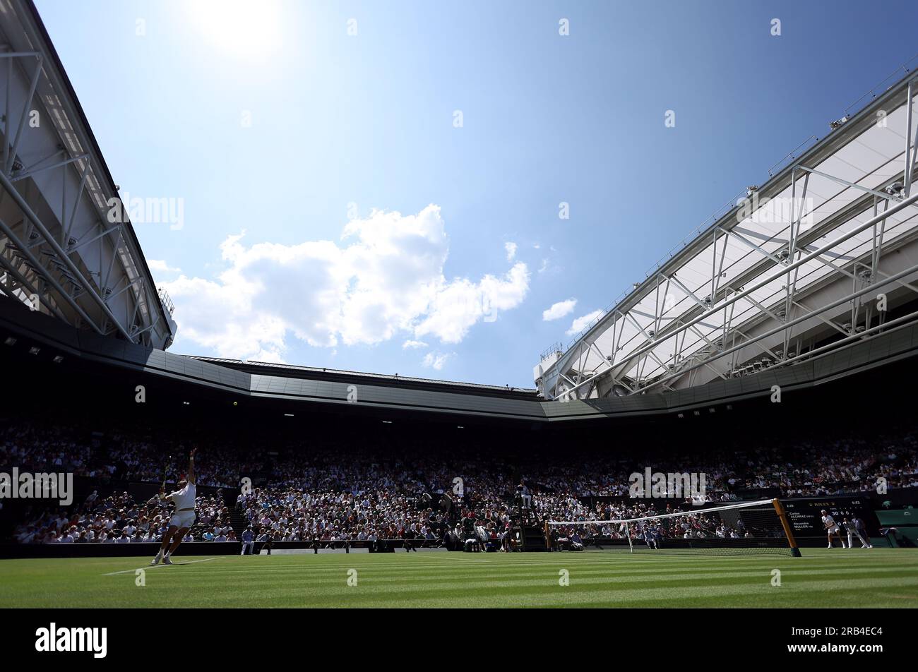 Carlos Alcaraz and Alexandre Muller in action on centre court on day ...