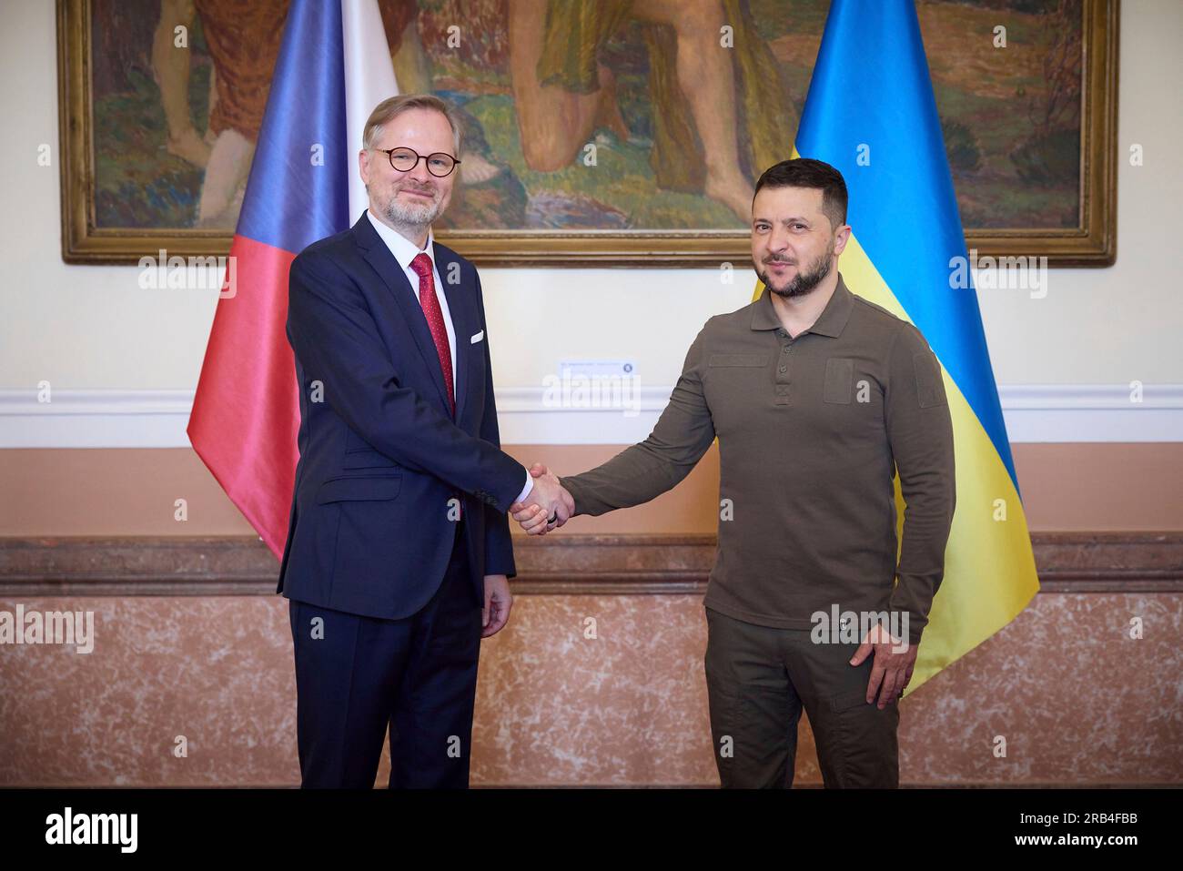 Prague, Czech Republic. 07th July, 2023. Czech Prime Minister Petr Fiala, left, shakes hands with Ukrainian President Volodymyr Zelenskyy before a bilateral meeting at the Straka Academy, July 7, 2023 in Prague, Czech Republic. Credit: Ukraine Presidency/Ukraine Presidency/Alamy Live News Stock Photo