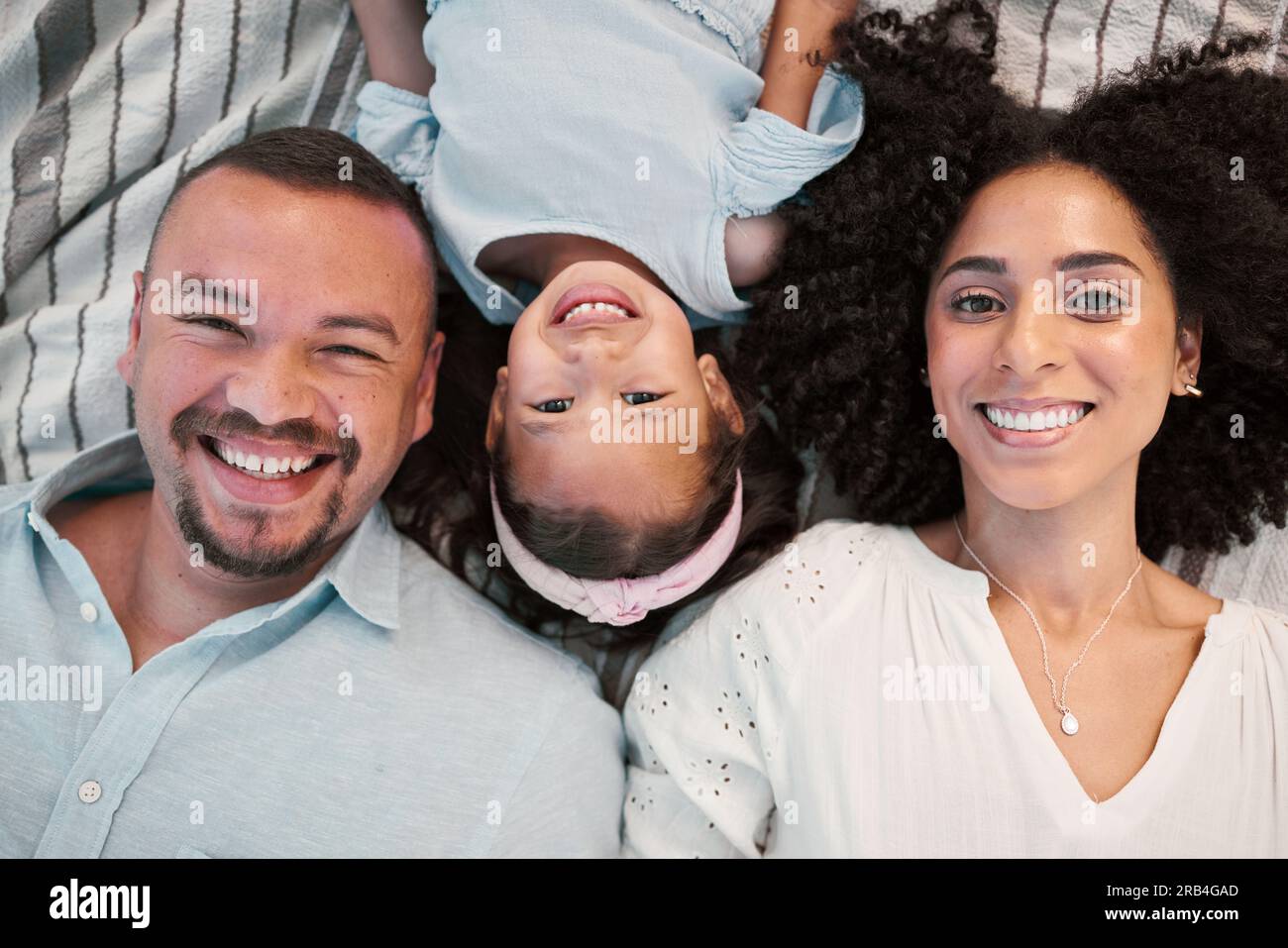 top-view-family-and-parents-with-girl-portrait-and-love-with-bonding-quality-time-and-support