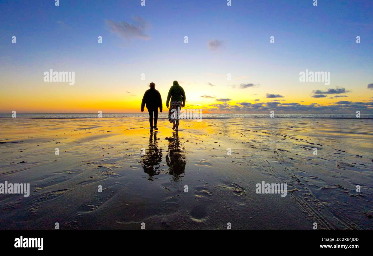 an-evocative-photograph-capturing-the-silhouette-of-two-teenage-girls