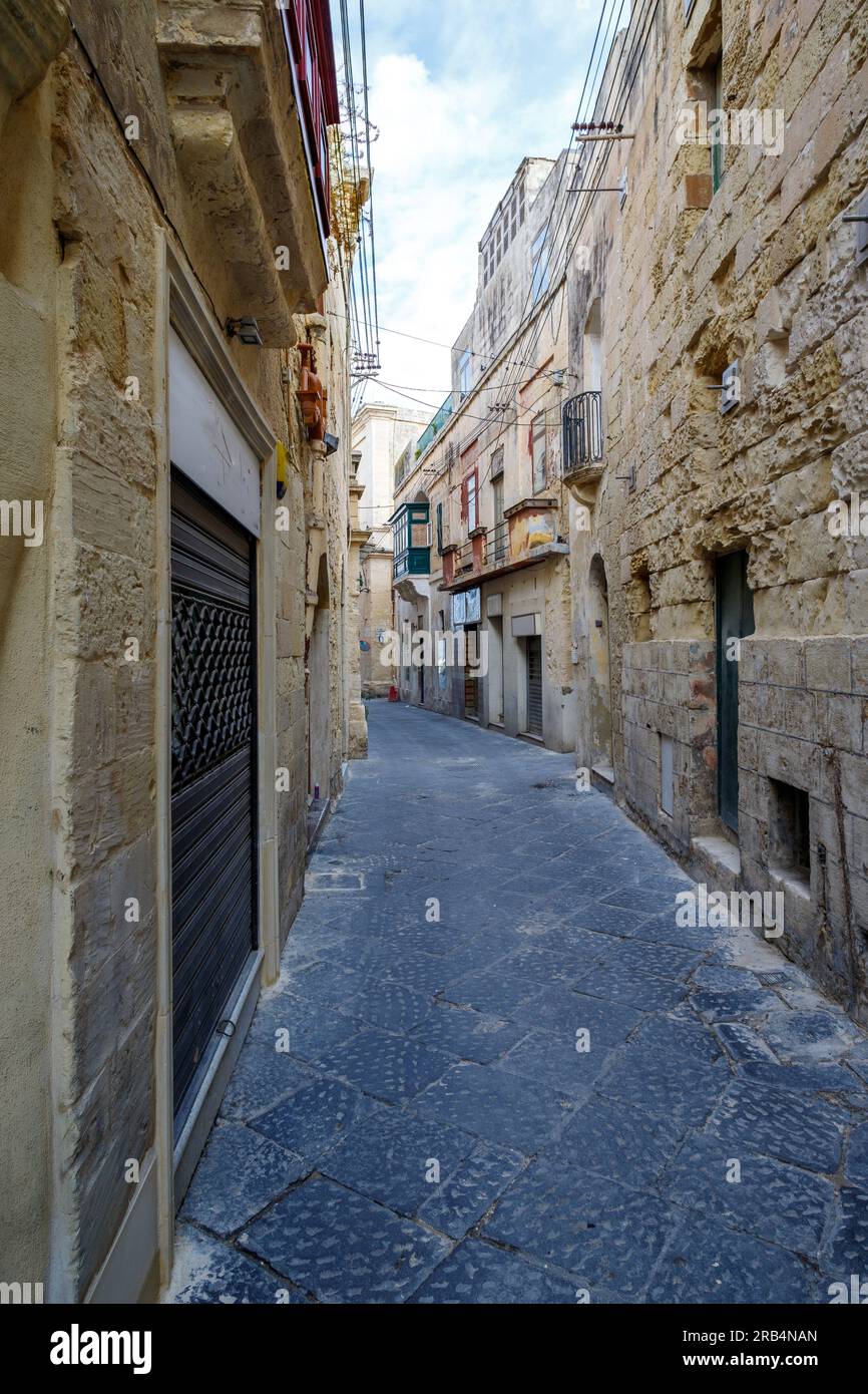 Characteristic alley of Ir-Rabat, Gozo, Malta, super-wide angle Stock Photo