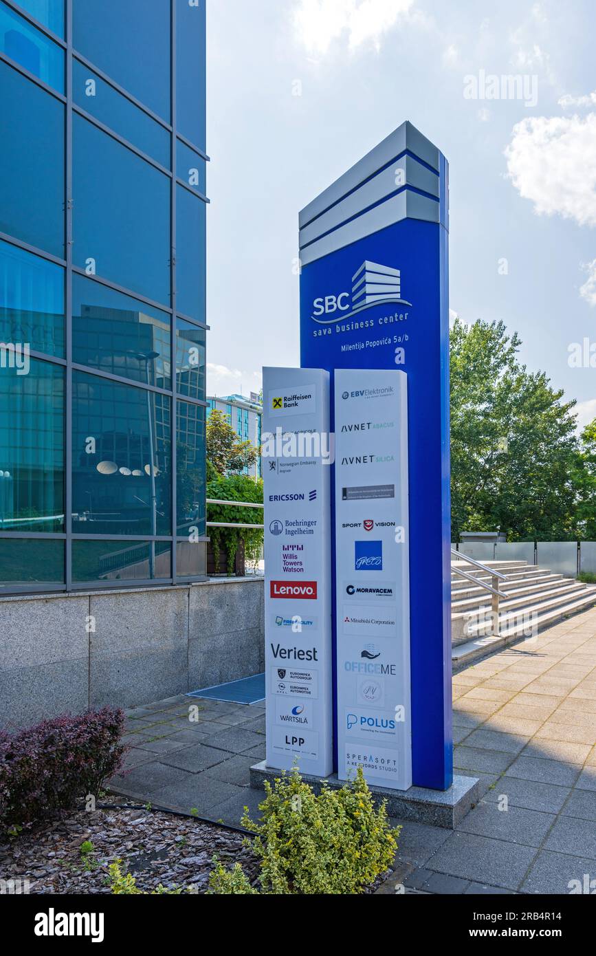 Belgrade, Serbia - June 19, 2023: List of Companies at Totem Board in Front of Sava Business Center SBC Building Milentija Popovica Street. Stock Photo