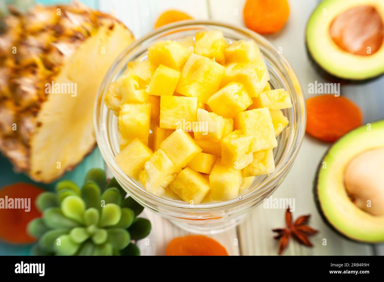 sliced pineapple on wood background Stock Photo