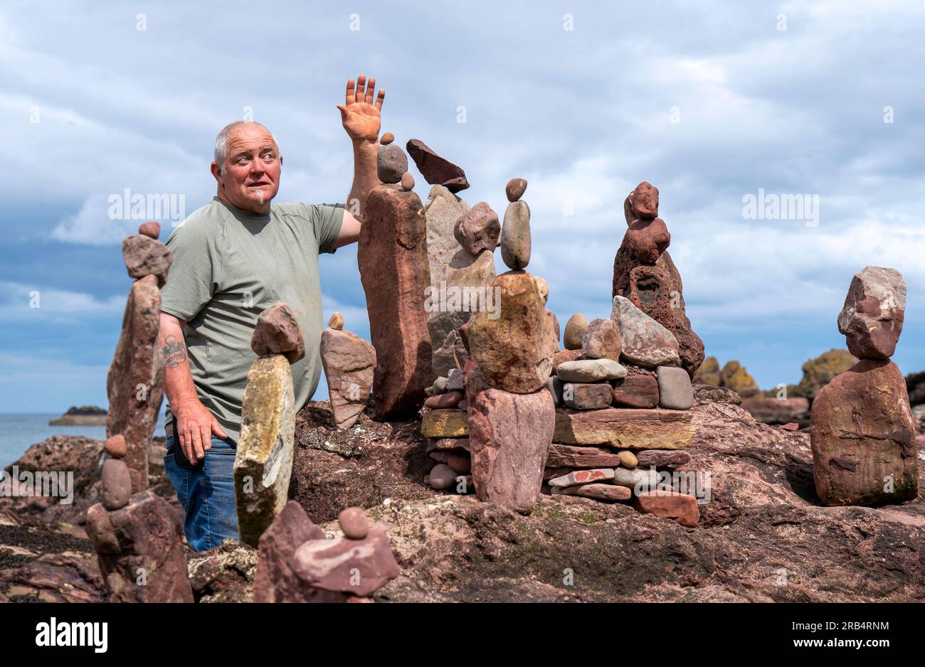 Artist Ken Bambury, from Dundee, creates stone stack sculptures on