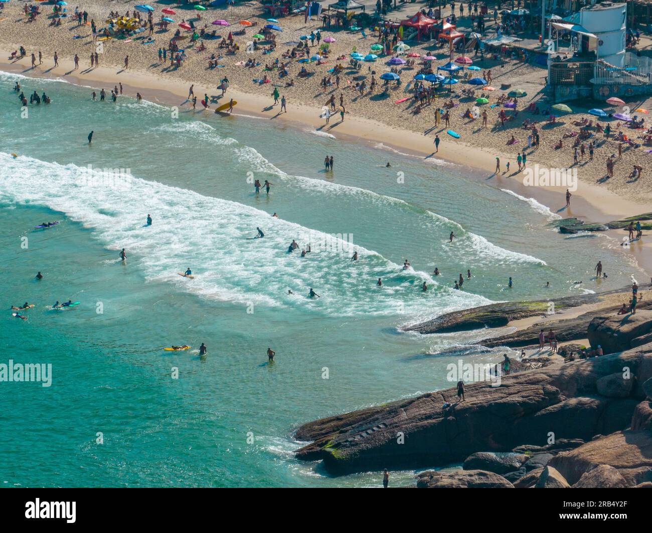 Aerial view of  Ipanema beach. People sunbathing and playing on the beach, sea sports. Surfing. Rio de Janeiro. Brazil Stock Photo